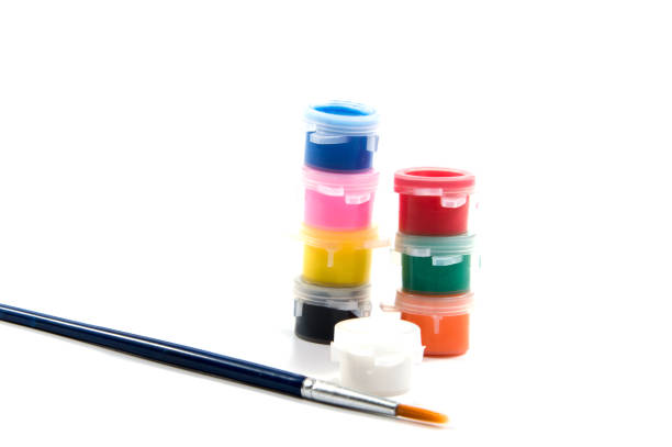 istock Brushes and paints to paint spread out isolated on white background. 641458700