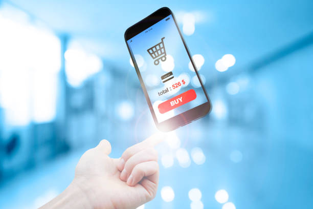 istock Transparent smart phone with shopping screen on hand 641459610