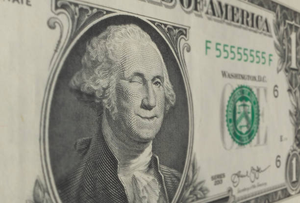 Winking US One dollar note close up WinkingUS One dollar note close up george washington photos stock pictures, royalty-free photos & images