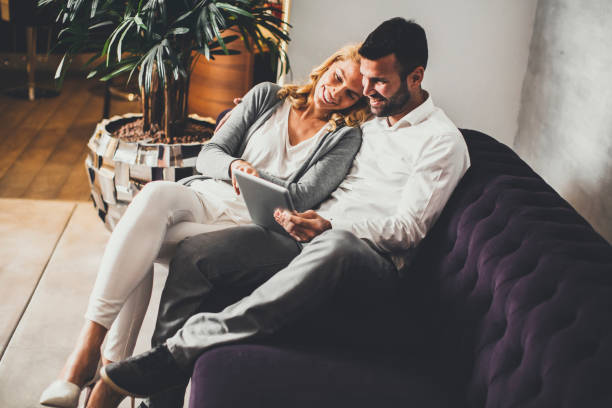 istock Romantic young couple in the room 641463914