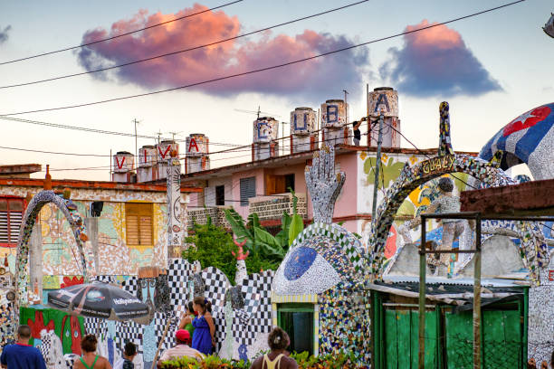 Queretaro, Mexico - January 6, 2025: Colorful ceramic mosaic wall with plates, tiles and decorative objects, photographed in Santiago de Queretaro, Mexico