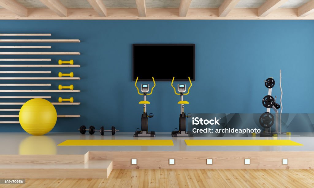 Blue room with gym equipment Blue room with spinning bike, pilates ball and hand weight - 3d rendering-Note: the room does not exist in reality, Property model is not necessary Gym Stock Photo