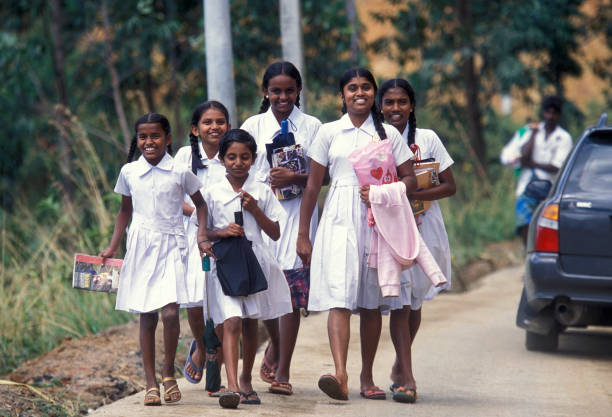 school childern near the town of Hikkaduwa in the southwest of Sri Lanka in Asien.
