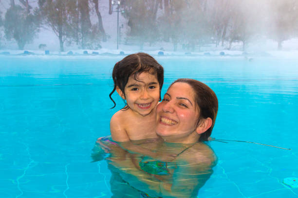 Boy Having Fun next to Swimming Pool