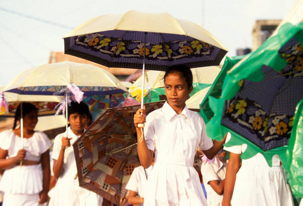 school childern near the town of Hikkaduwa in the southwest of Sri Lanka in Asien.