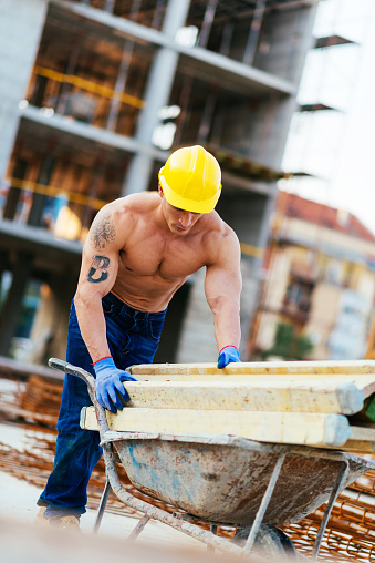 Strong Construction Engineer Strong And Muscular Manual Construction Worker Working On Construction ...