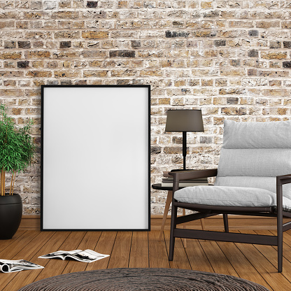 Blank picture poster frame template. Armchair in the living room interior with old brick wall. copy space background mock up. hardwood floor, a plant, lamp. square composition render. hipster design elements