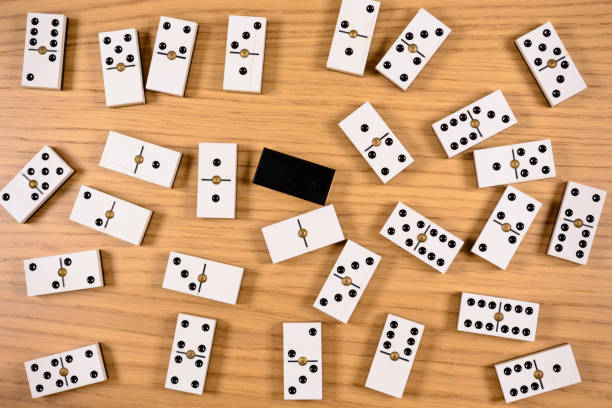 istock pieces of domino on wood with space for text 641483080