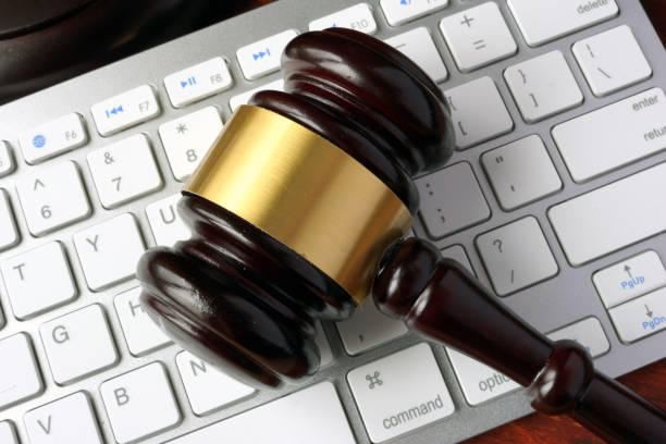 istock Gavel and keyboard. Internet fraud concept. 641487100