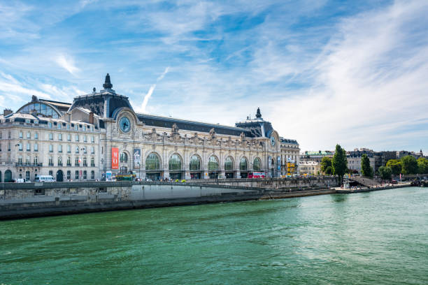 The Orsay Museum Orsay Museum, seen from the right bank of the Seine river. Notice that the museum building was originally a railway station. essonne stock pictures, royalty-free photos & images