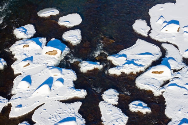 istock Cracked ice on the river - winter scenery 641490666