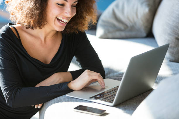 istock Happy young woman enjoying a good laugh 641493822