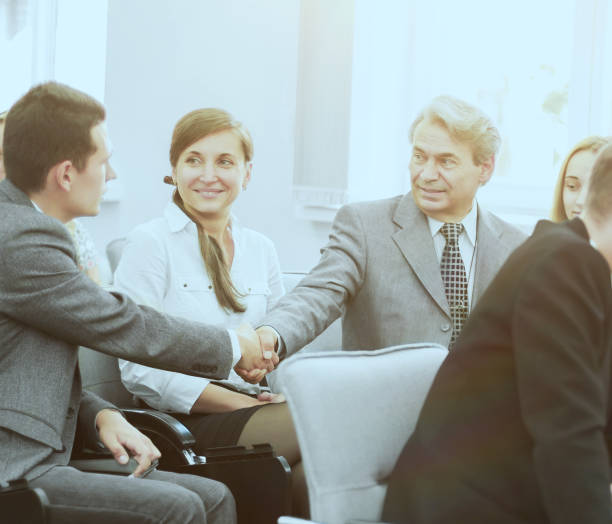 istock business partners shake hands in the conference room 641496530