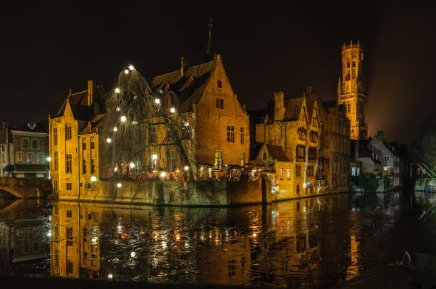 Romantic night scenery in the Old Town of Bruges, Belgium stock photo