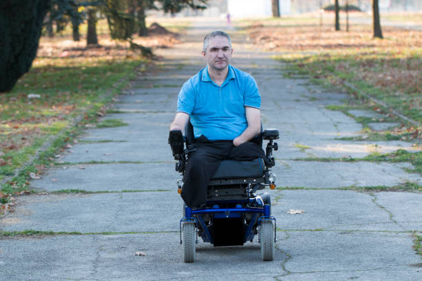 istock Man in electric wheelchair posing 641498620