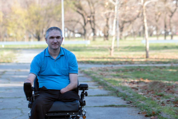 istock Man in electric wheelchair posing 641498646