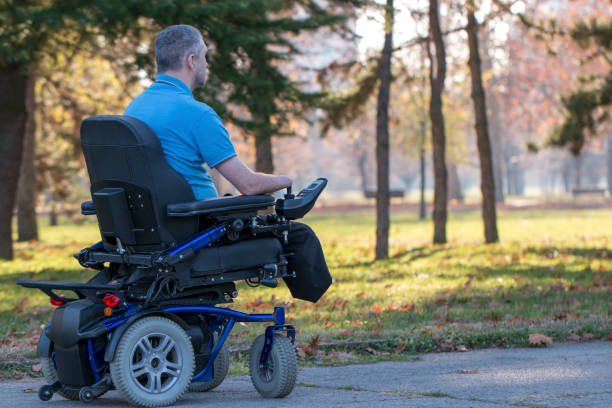 istock Man in electric wheelchair posing 641498688