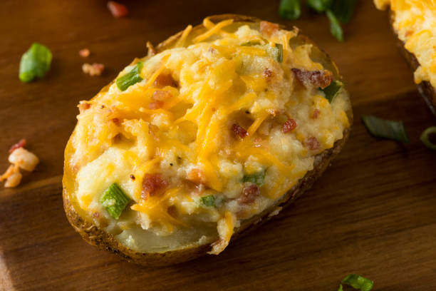 Homemade Twice Baked Potatoes Homemade Twice Baked Potatoes with Bacon and Cheese baked potato stock pictures, royalty-free photos & images