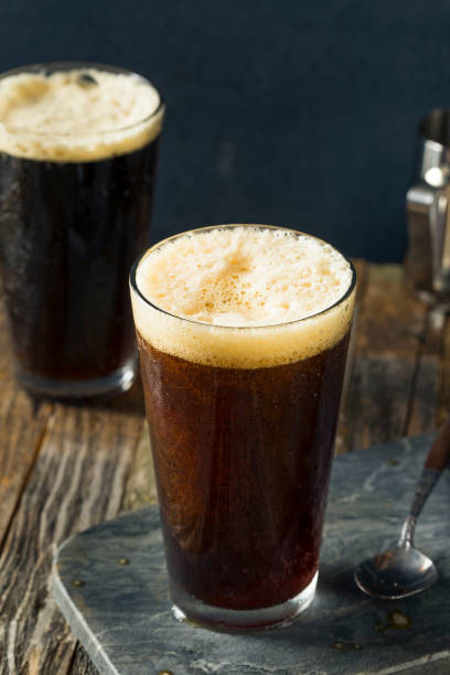 Frothy Nitro Cold Brew Coffee Frothy Nitro Cold Brew Coffee Ready to Drink caffeine molecule stock pictures, royalty-free photos & images