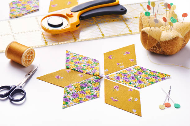 istock Design  element of  quilt in progress, prepared cut pieces and sew one around accessories, patchwork 641502130