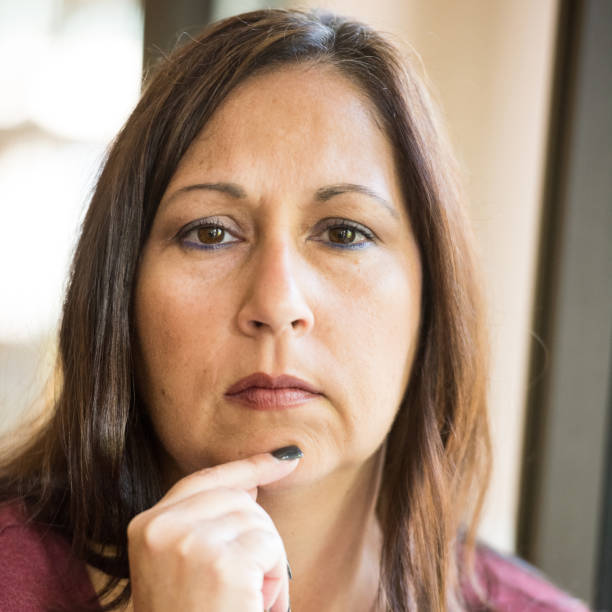 istock Pensive mature woman 641508122