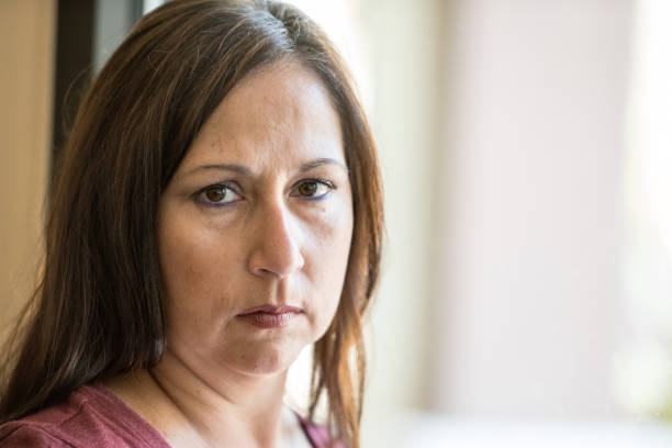 istock Pensive mature woman 641508142