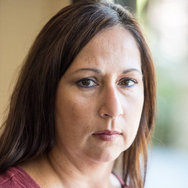 istock Pensive mature woman 641508160