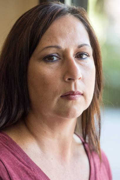 istock Pensive mature woman 641508162