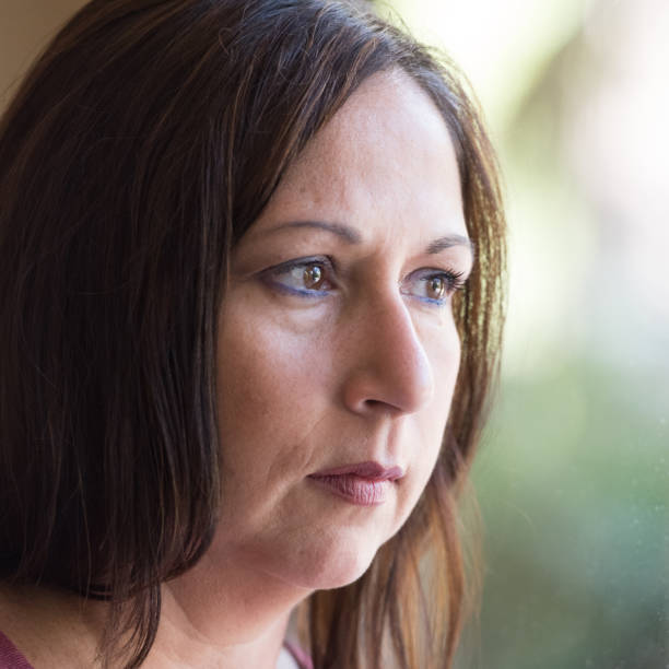 istock Pensive mature woman 641508174
