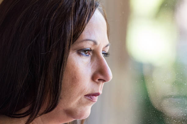 istock Pensive mature woman 641508184