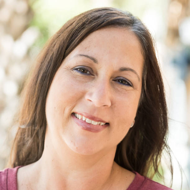 istock Smiling mature woman 641508238