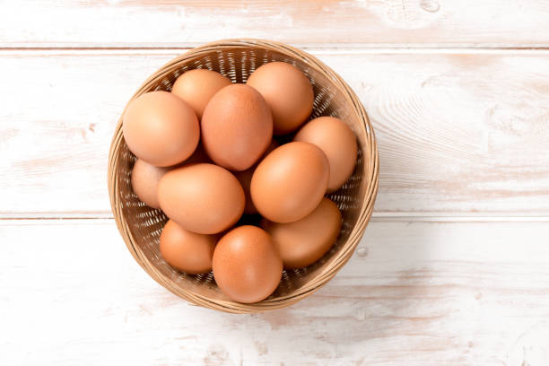 istock Overhead of Brown Chicken Eggs in Wicker Tray 641509024