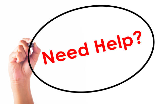 istock Businessman writing Need Help word with pen 641515952