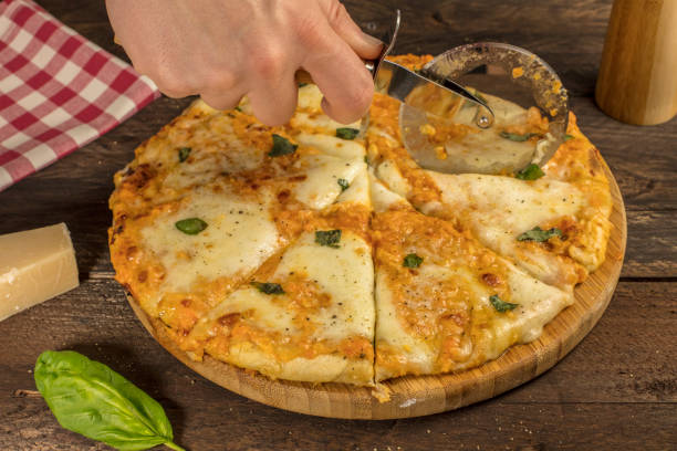 istock Pizza knife over a homemade Margherita 641516662