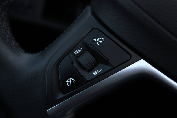 istock Speed limitation and cruise control buttons on Car 641517132