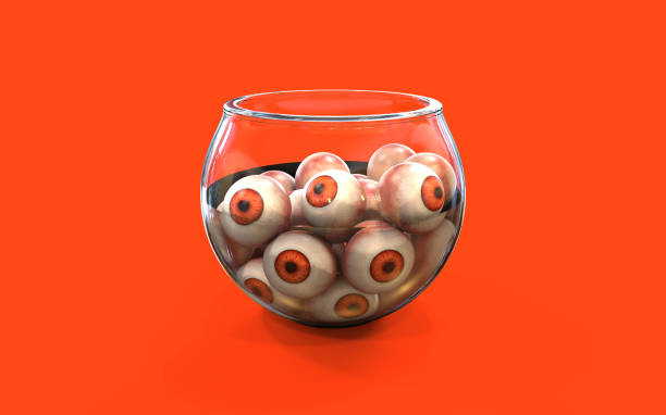 Eye ball halloween candy in Bowl Eye ball halloween candy in Bowl on orange background, 3d eye candy stock pictures, royalty-free photos & images