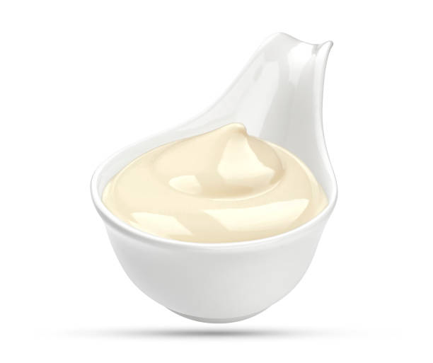 istock Mayonnaise sauce in bowl isolated on white 641521128