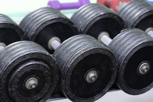 istock dumbbells in a fitness hall 641522302