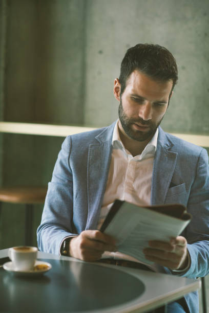 istock Businessman working in cafe 641527354