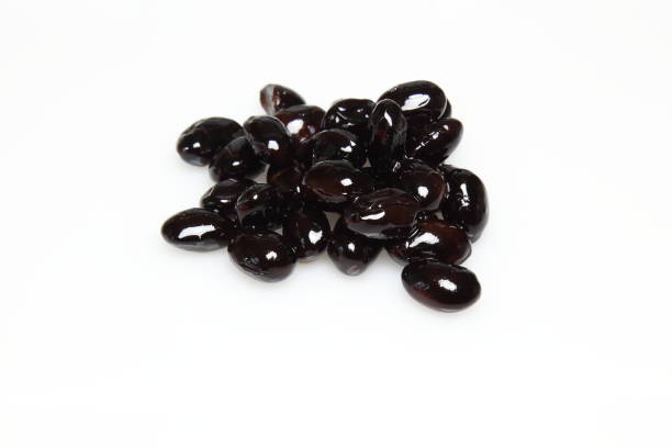 istock Boiled black beans in a white background 641527816