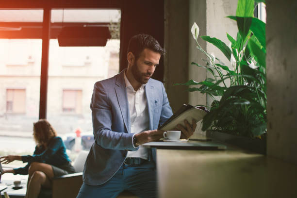 istock Businessman in cafe 641528652