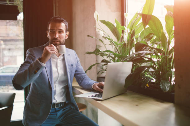 istock Businessman working in cafe. 641528720