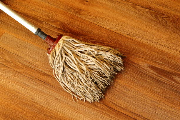 istock old mop on wooden parquet 641531372