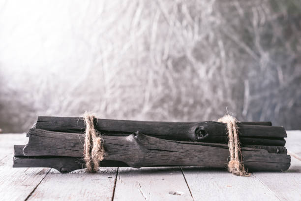 istock Firewood on wooden table, Christmas decoration background 641533378