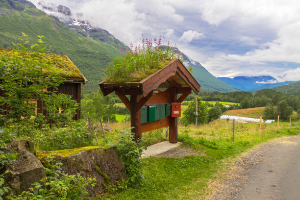 Norwegian mailboxes with grass roof stock photo