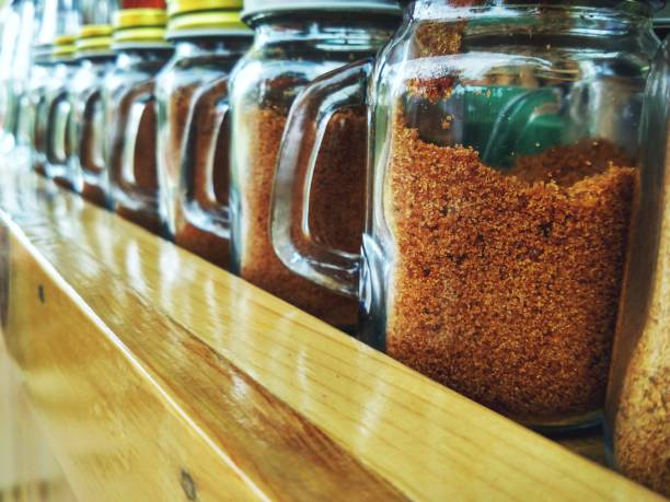 istock brown sugar in glass bottle 641534948