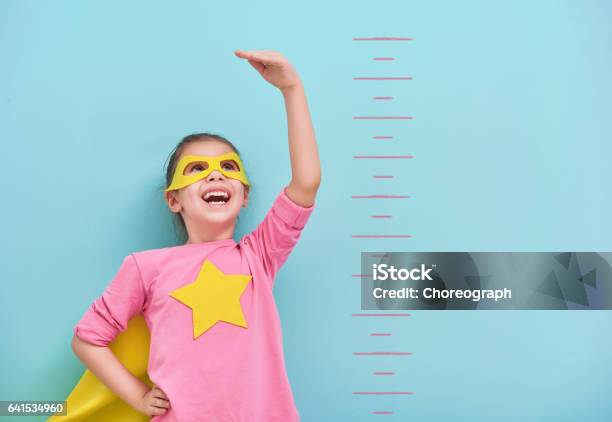 Child Plays Superhero Stock Photo - Download Image Now - Child, Measuring, Growth