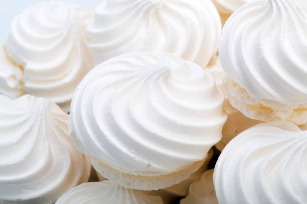 istock French vanilla meringue cookies on white background 641536802