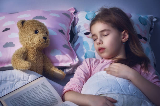 istock girl is napping in the bed 641536820