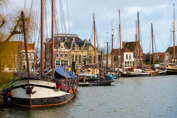 Historic city of Enkhuizen in Netherlands Enkhuizen, Netherlands - January 12, 2017: Cityscape with ships and marina in the historic city of Enkhuizen, known for well-preserved historic houses and one of the largest marinas in Netherlands. enkhuizen stock pictures, royalty-free photos & images